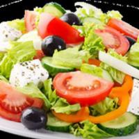 Greek Salad · Lettuce, feta cheese, onion, black olive, tomato, cucumber.