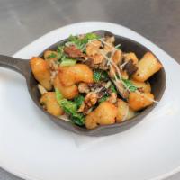 Gnocchi  · Yukon gold potato, wild mushrooms, kale, walnuts, parmesan, sage-white balsamic brown butter