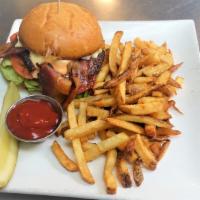 Trc Burger · Gluten free preparation. Seven ounce imperial wagyu beef, bacon, queso, lettuce, tomato, oni...