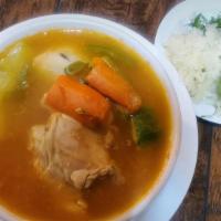Caldo De Pollo · Chicken soup with vegetables.
