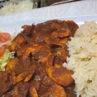 Camarones A La Diabla · Seasoned shrimp sautéed in a juicy and extra hot sauce. Served with rice, house salad, pico ...