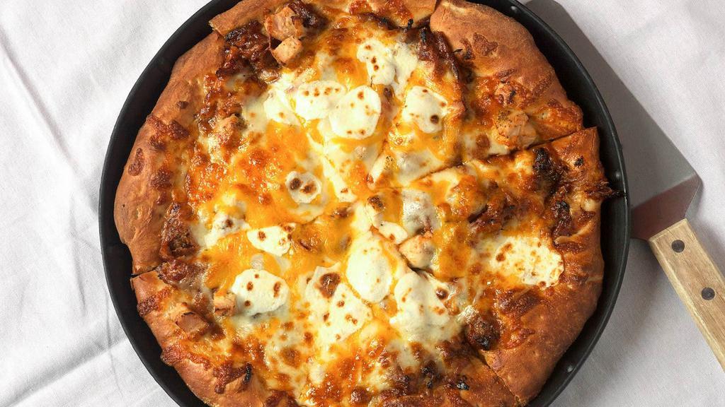 Smokehouse · Big woods signature. Hickory smoked pulled pork, smoked chicken, fresh mozzarella, mozzarella blend, and shredded cheddar on a bbq sauce base.
