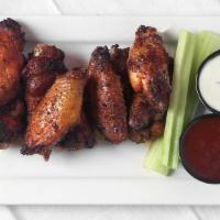 Signature Brewer'S Wings · Big woods signature. Gluten-free. Spicy. Nine assorted flats and drummies marinated in big w...