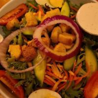 House Salad · Vegetarian friendly. Artisan greens, tomatoes, pickled carrots, onion, cucumber, cheddar che...