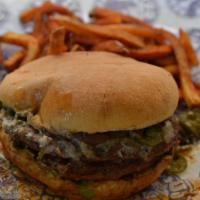 Black-N-Bleu Burger · Two patties with cajun blackened seasoning and blue cheese crumbles.
