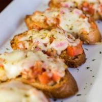 Toasted Bruschetta · A wonderful blend of Fresh Diced Tomato, Red Onion, Garlic, Basil and Italian Seasonings, to...