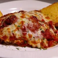 Homemade Meat Lasagna · A generous portion of our Homemade Lasagna, prepared with Fresh Pasta, Ground Beef, Ricotta,...