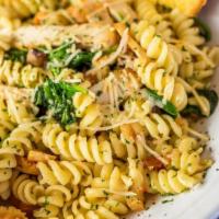 Chicken Pasta Florentine · Chicken Sautéed With Fresh Garlic Butter And Tossed With Fresh Tomatoes, Spinach And Spiral...