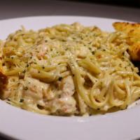 Crab Linguini · Over One-Half Pound of True Snow crab, Sautéed to Perfection in our Signature Alfredo Sauce...