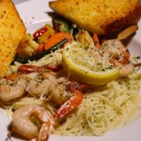 Shrimp Skewers · 2 Shrimp Scampi Skewers grilled to perfection, served over a Bed of Angel Hair Pasta sautée...