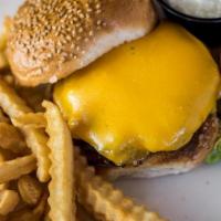 Cheeseburger · Quarter Pound Burger topped with your choice of Mozzarella or American Cheese, Lettuce, Toma...