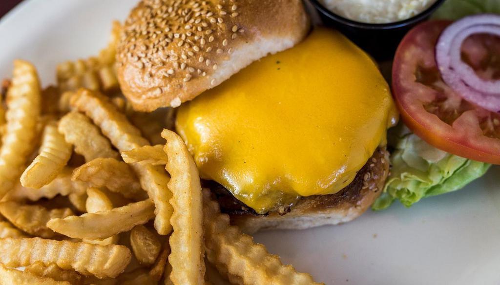 Cheeseburger · Quarter Pound Burger topped with your choice of Mozzarella or American Cheese, Lettuce, Tomato and Onion