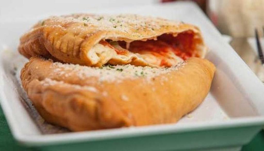 Pocket Pizza · Mozzarella Cheese, Papa’s Signature Marinara Sauce and One Topping sealed inside a folded Pizza Crust and cooked to perfection