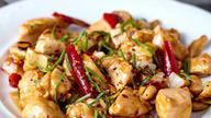 Kung Pao Chicken 宫保鸡丁 · Spicy. Crispy peanuts, green peppers, carrot with celery sautÃ©ed in spicy sauce. Served wit...