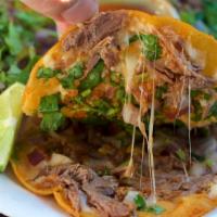 Mulita · Your choice of slow cooked beef or chicken birria meat served between crunchy tortillas fill...