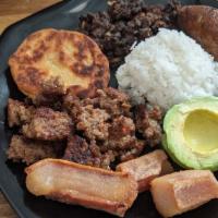 Bandeja Paisa · Served with white rice, beans, eggs, fried plantain, avocado, Colombian sausage, pork rind, ...