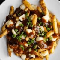 Classic Poutine · Crispy fries, white cheddar cheese curds, silky beef gravy & scallions. (cal 820)