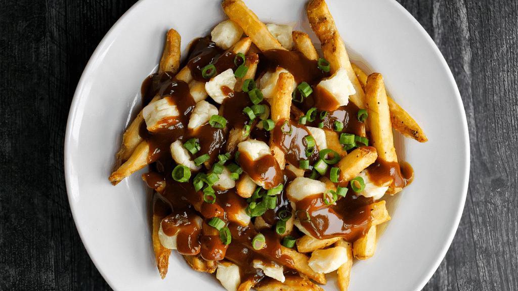 Classic Poutine · Crispy fries, white cheddar cheese curds, silky beef gravy & scallions. (cal 820)