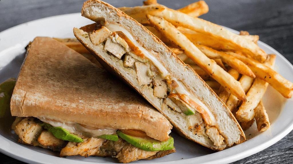 Italian Chicken Panini · Chicken breast, tomatoes, avocado, pesto mayo, provolone & a drizzle of balsamic glaze on grilled Italian bread. Served with crispy baked fries. (cal 1480)
