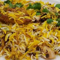 Sindhi Chicken Biryani · Bold and flavourful south Asian dish. Steamed fragrant basmati rice layer with spicy boneles...