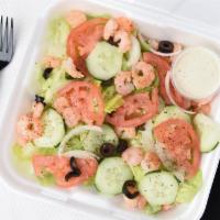 Shrimp Salad · Fresh shrimp, black olives, red onions and tomatoes served on a crisp bed of lettuce.