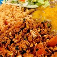 Machaca / Machaca · Un delicioso mix de carne desmenuzada, huevos revueltos, cebollas y pimientos. Con lechuga y...