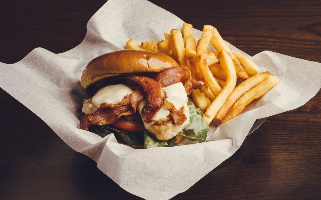 Grilled Chicken Club · Char-grilled chicken breast, smoked bacon, provolone cheese, lettuce, tomato your choice of sauce on a brioche bun.