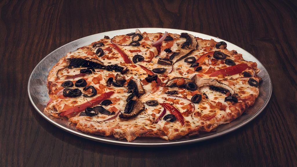 The Herbivore Pizza · Marinara, portabella mushrooms, red bell peppers, red onions, tomato, black olives, mozzarella.