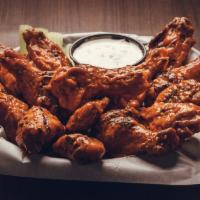 Trashed Wings · Hardwood smoked chicken wings finished off deep fried or char-grilled W/ celery, carrots and...