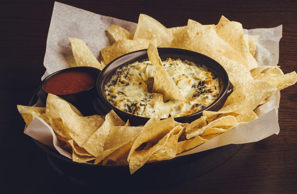 Artichoke Spinach Dip · Cheesy baked spinach & artichoke dip with tortilla chips.