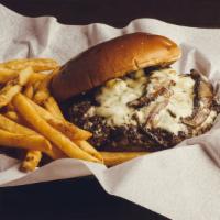 The Fun Guy · 1/2 pound blackened burger with sautéed portabella mushrooms & onions, melted Swiss & bleu c...