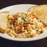 Voodoo Mac + Cheese · Spiral macaroni, grilled chicken, grilled shrimp, sautéed  onions & red bell peppers tossed ...