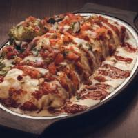 Big Ole' Burrito · Choice of meat, cilantro lime rice, black beans & fire-roasted corn wrapped in a large torti...