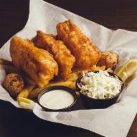 Fish + Chips · Three Atlantic cod fish filets hand-dipped in beer batter with fries, coleslaw, hush puppies...