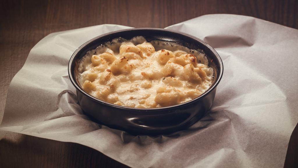 White Cheddar Mac Side · Spiral macaroni baked with white cheddar cheese.