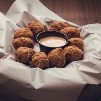 Hushpuppies Side · Served with Tavern Sauce.