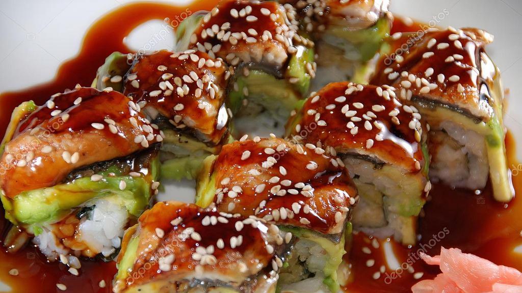 Dragon Maki · shrimp tempura and cucumber roll topped with eel, avocado and tobiko