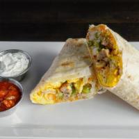 Breakfast Burrito (Petit Déjeuner Burrito) · Hash browns, egg, bell peppers, onions, cheddar cheese, and choice of meat.