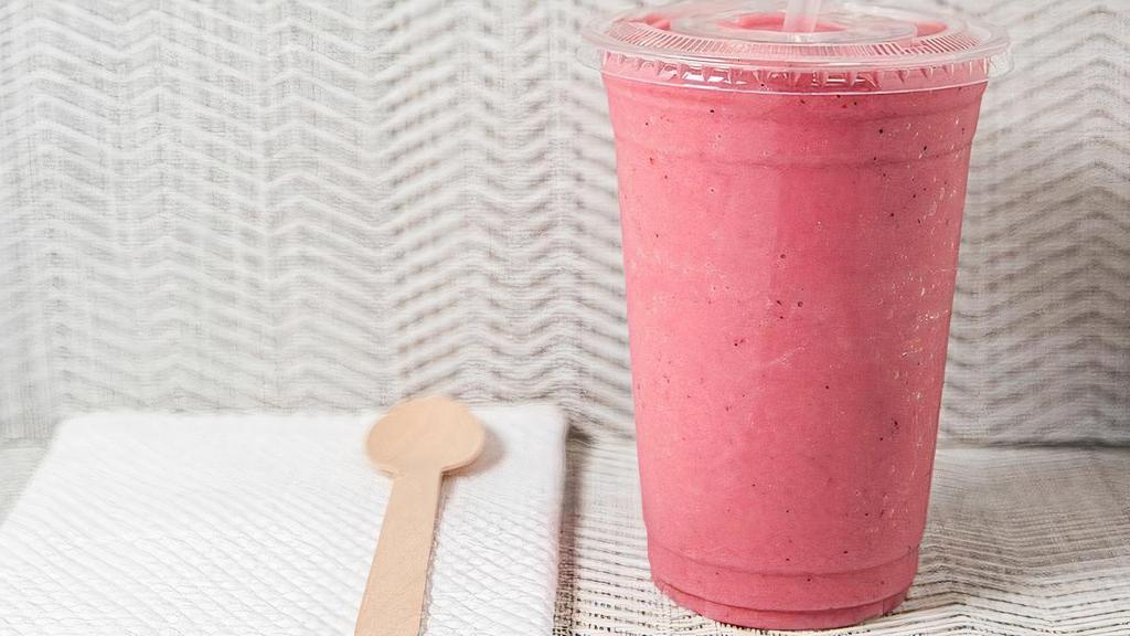 Dragon Smoothie · This beautiful smoothies is backed by a great flavor personality.  Made with dragon fruit, pineapple, mango, peach, strawberry, unsweetened coconut and agave.  Vegan the way it come it will have you saying 