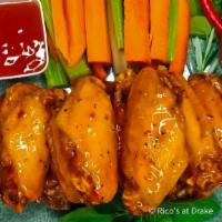 Wings (Half & Half) Sauce (12 Pieces) · A dozen wings with two sauces of choice.