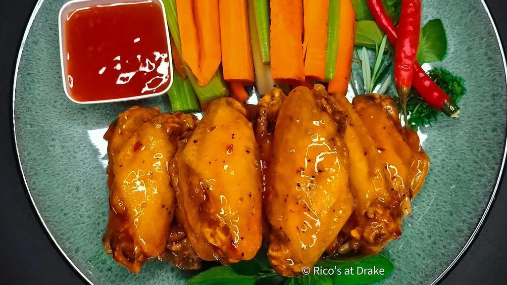 Wings (Half & Half) Sauce (12 Pieces) · A dozen wings with two sauces of choice.