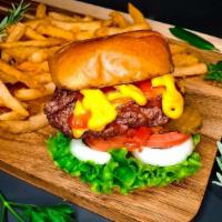 Classic Beef Burger & Fries · Quarter-pounder patty with cheese on burger buns with fresh onion, lettuce, tomato and pickl...