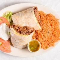 Breakfast Burrito · Seasoned taco meat, onions, home fries, peppers, tomatoes, scrambled eggs and refried beans ...