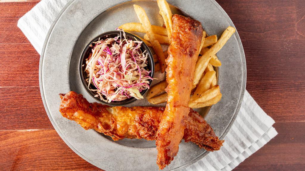 Fish & Chips · House favorite.
Our famous large beer battered fish fillets with fries, coleslaw and a side of tartar sauce.