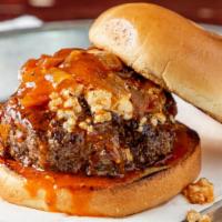 Buffalo Bleu Burger · Half pound burger with bleu cheese crumbles, caramelized onions, house made buffalo sauce, l...