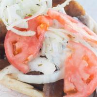 Gyros Sandwich · Gyros sauce, onions and tomatoes.