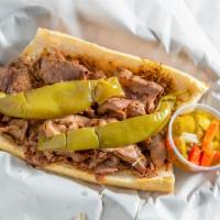 Bbq Beef Sandwich · Served with sweet or hot peppers. Add cheese and extra peppers for additional charge.
