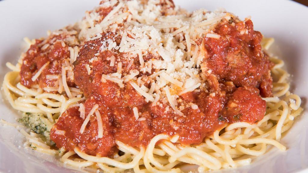 Spaghetti & Meatballs · Three large meatballs atop spaghetti with our Green Mill classic red sauce. Sprinkled with parmesan.