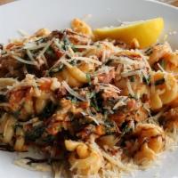 Pomodoro Florentine · Shrimp, spinach, tomato bruschetta, and trottole noodles tossed in a sundried tomato cream s...