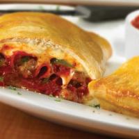 Extreme Supreme Calzone · Sausage, pepperoni, Canadian bacon, mushrooms, onions, green peppers, black and green olives...